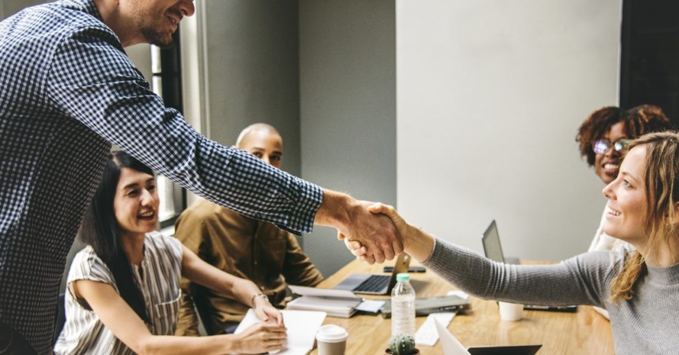 Business people shaking hands in agreement